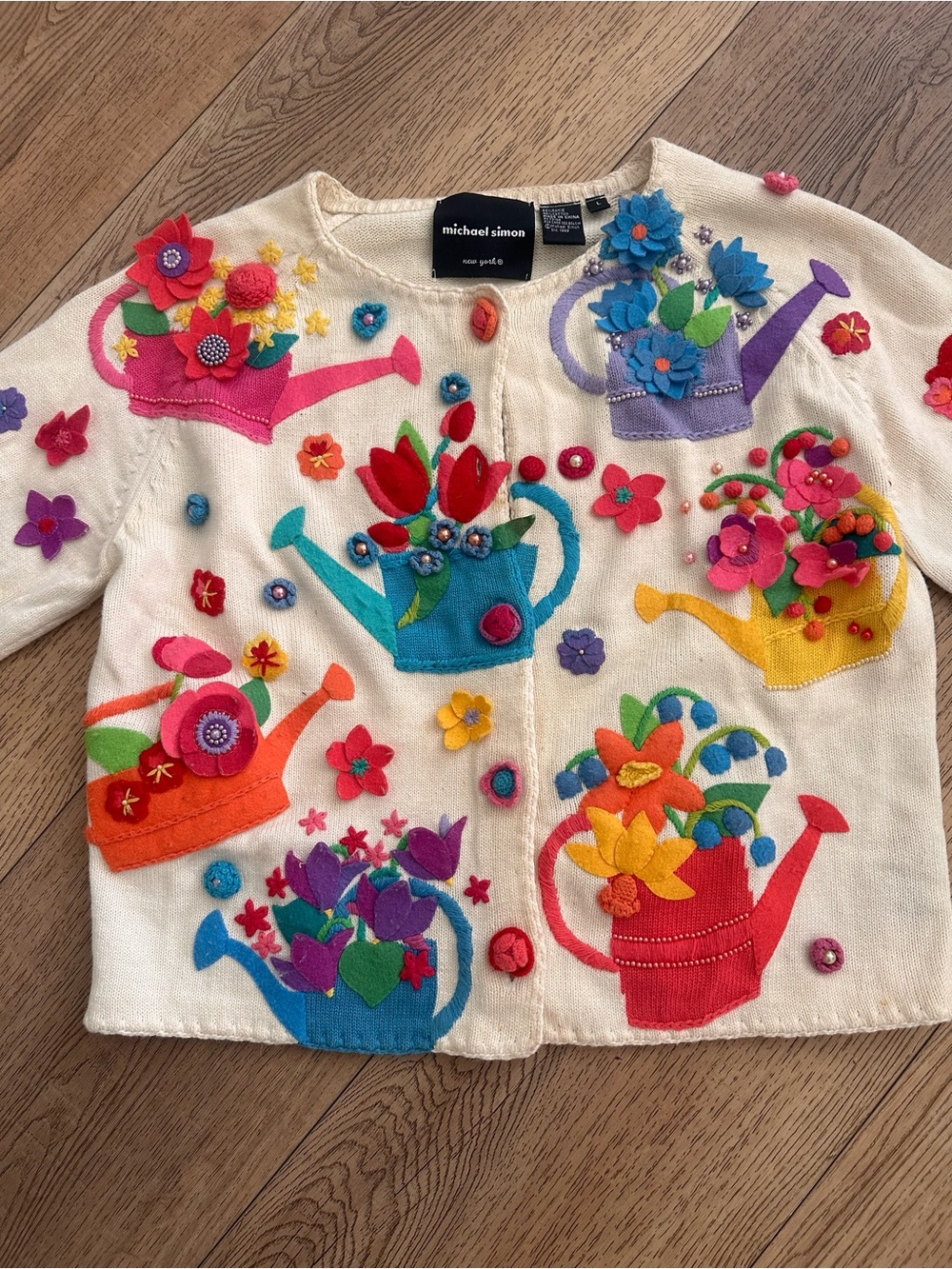 michael simon New York Cream Cardigan with Colorful Watering Can Appliqués